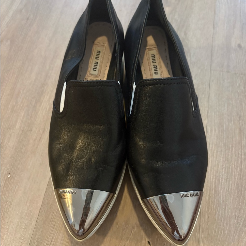 Miu Miu Black Loafers with Silver Toe